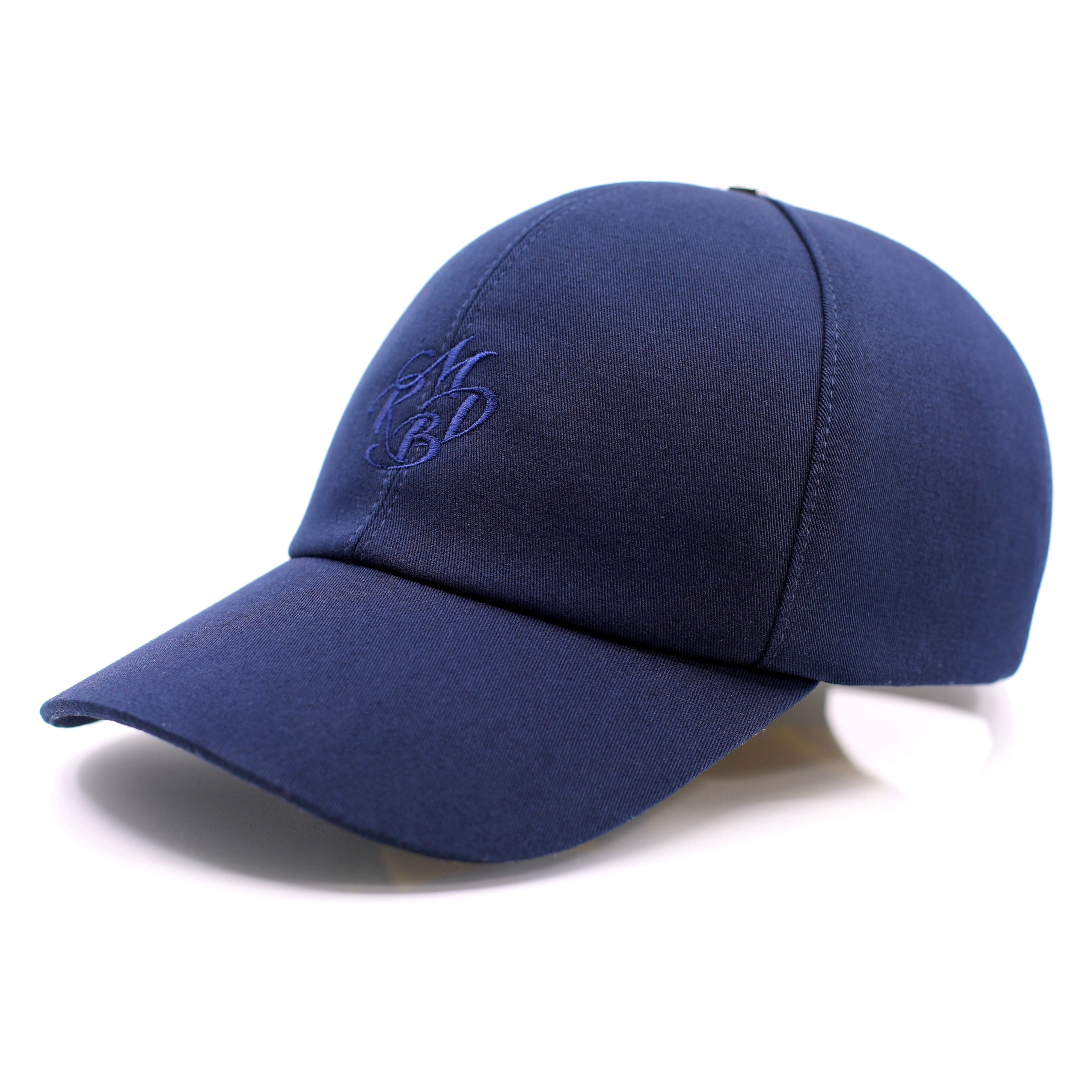 casquette de golf haut de gamme bleu marine brodée fil doré fabriquée en France Mark De Belleroy