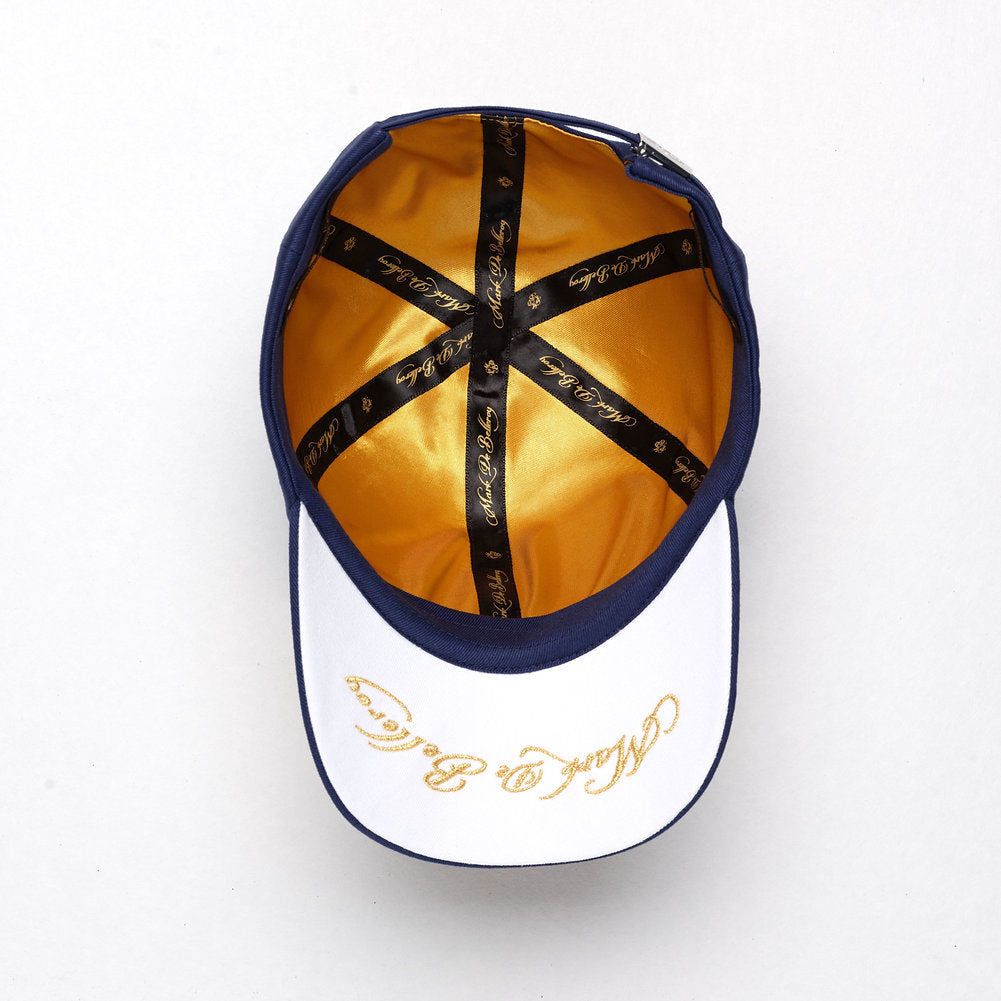 casquette de luxe bleu marine intérieur satin doré vue arrière made in France Tour Eiffel mark de belleroy